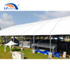 Large outdoor exhibition marquee structure on lawn